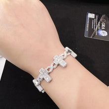 Load image into Gallery viewer, Small Infiniti Cross Bracelet
